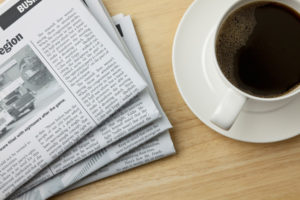 Newspaper and coffee