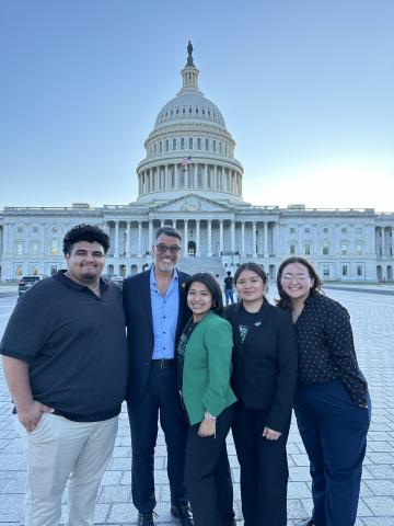 Cleo with the 2024 interns in front of the Capitol.